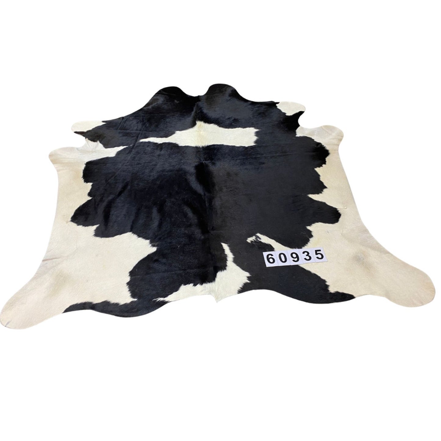 Black and white cowhide rug