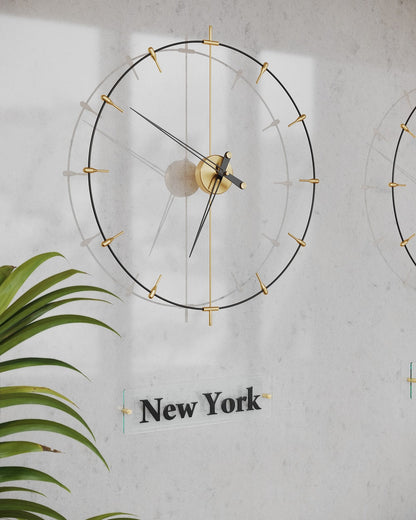 modern world clocks hanged on the lobby wall and there is newyork amblem under it.