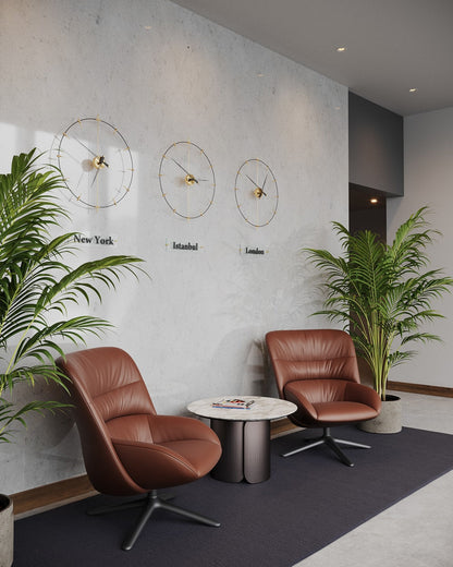 modern world clocks hanged on the lobby wall.