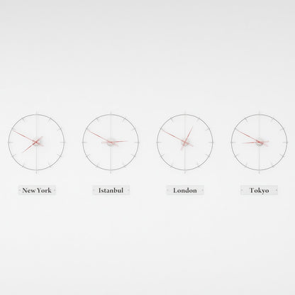 red and black world clocks are on the white background.